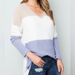 85% Polyester 15% Spandex

Fit: Relaxed tunic style, women's fit